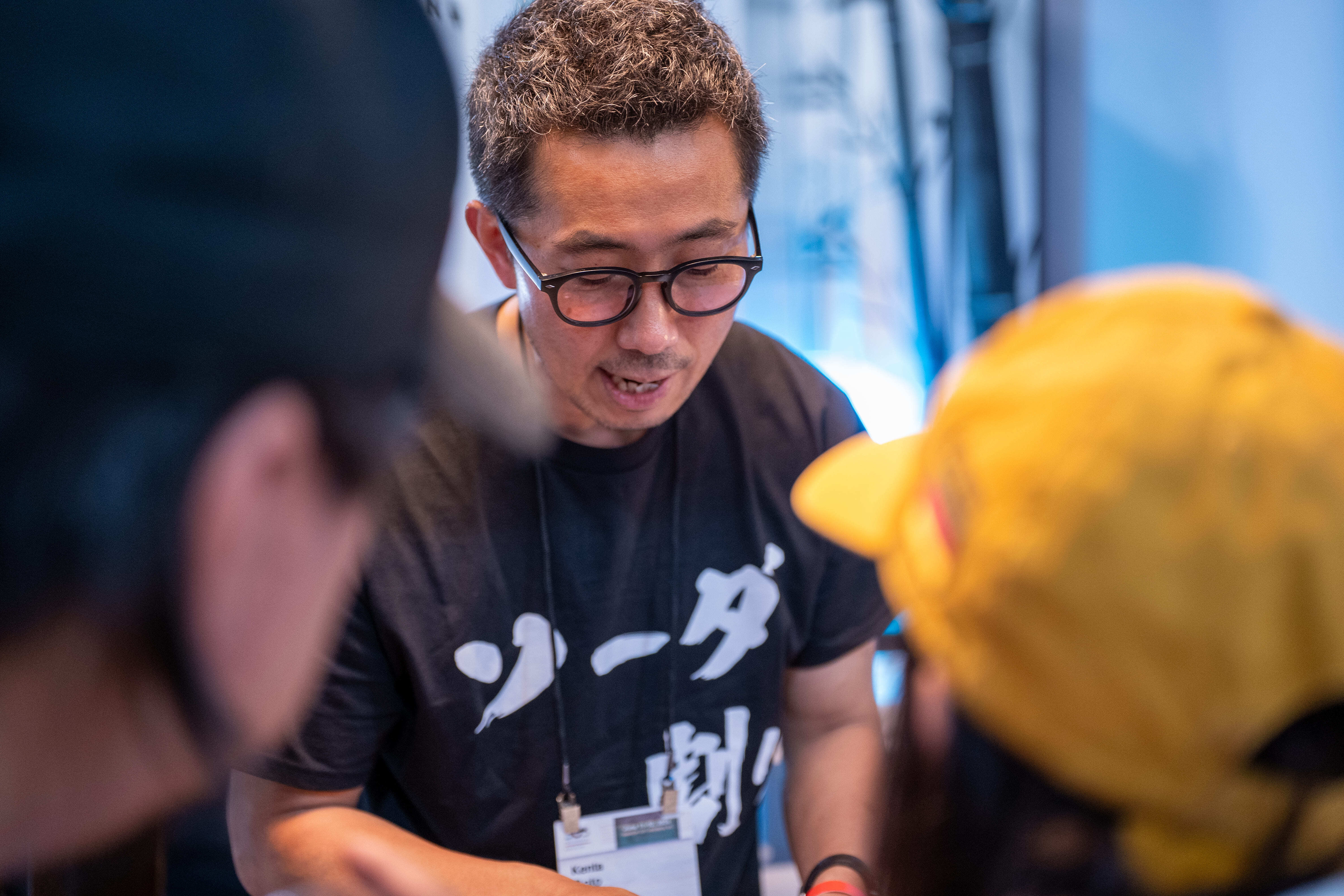 Kenta Goto, owner-bartender of Bar Goto and Bar Goto Niban, showcasing his skills as a guest bartender at the iichiko USA booth.