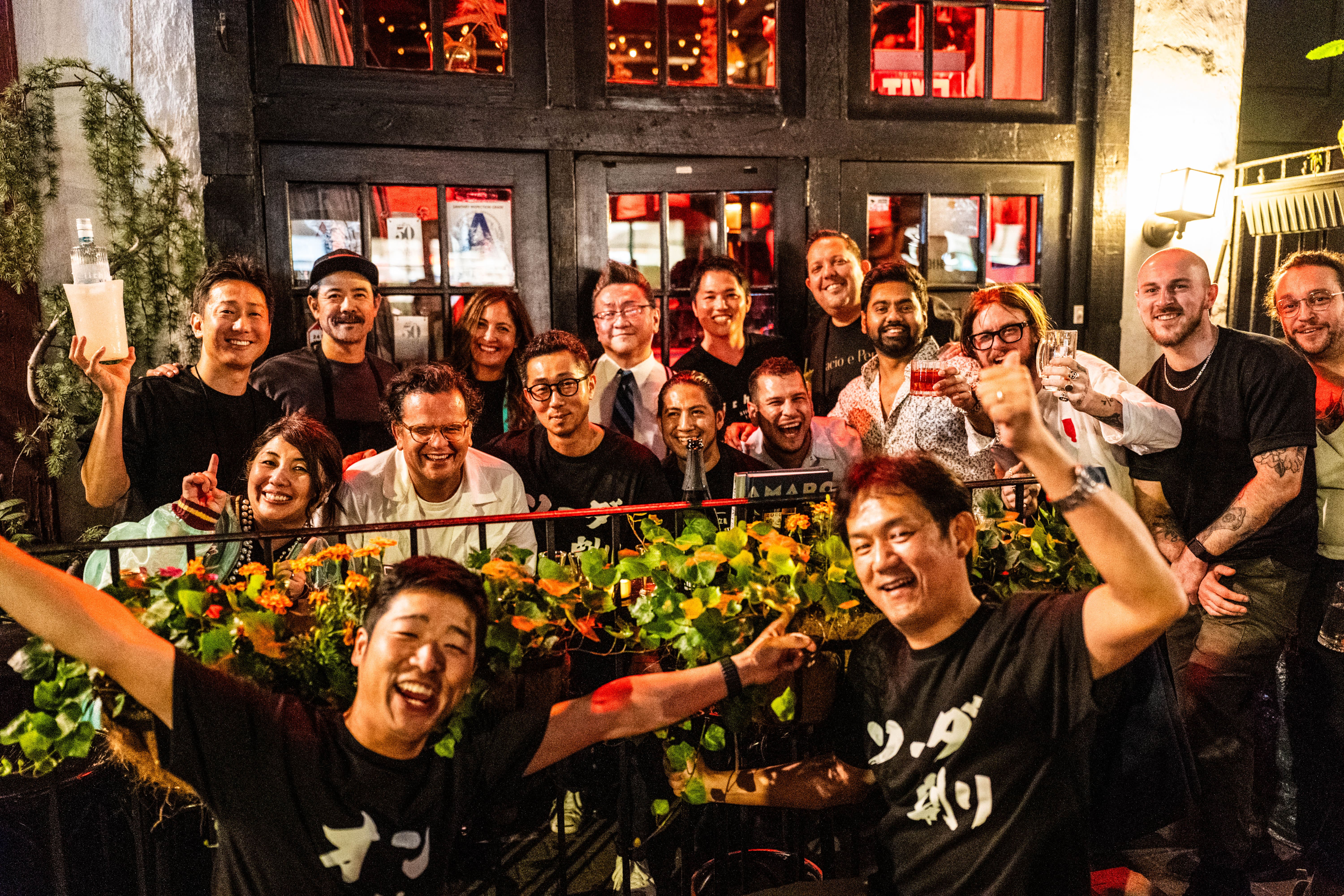 Kensuke Oka of iichiko USA, Inc. (front left) in front of Katana Kitten.